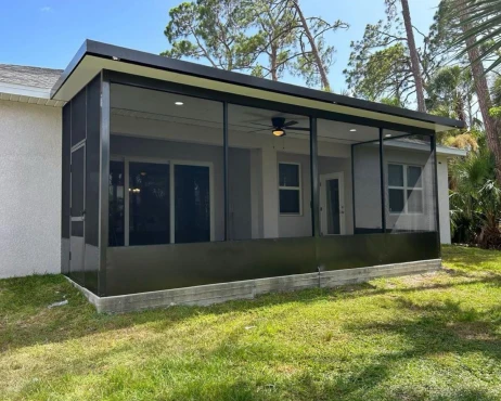 Screen enclosure with dark glass.